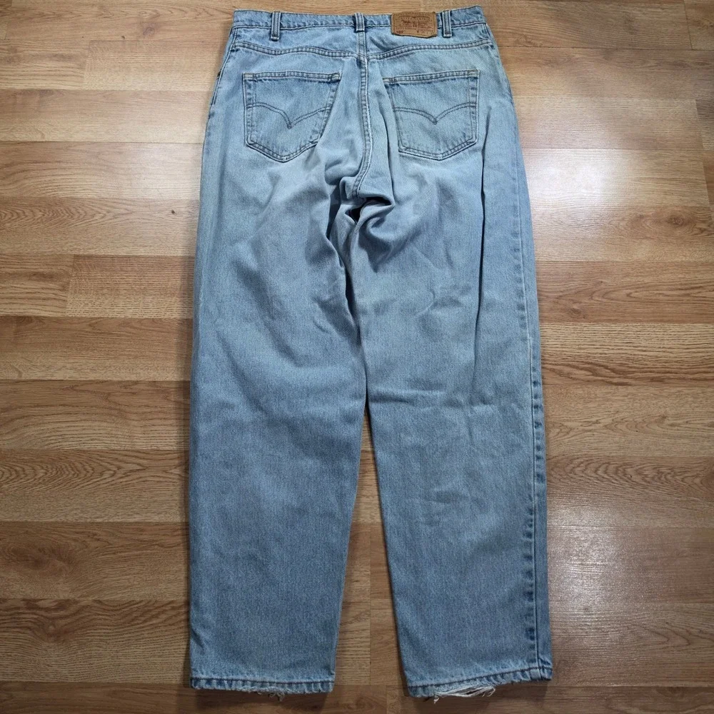 Vintage Levi's 560 Loose Fit Tapered Leg Jeans Mens 36x32 Light Wash Blue USA